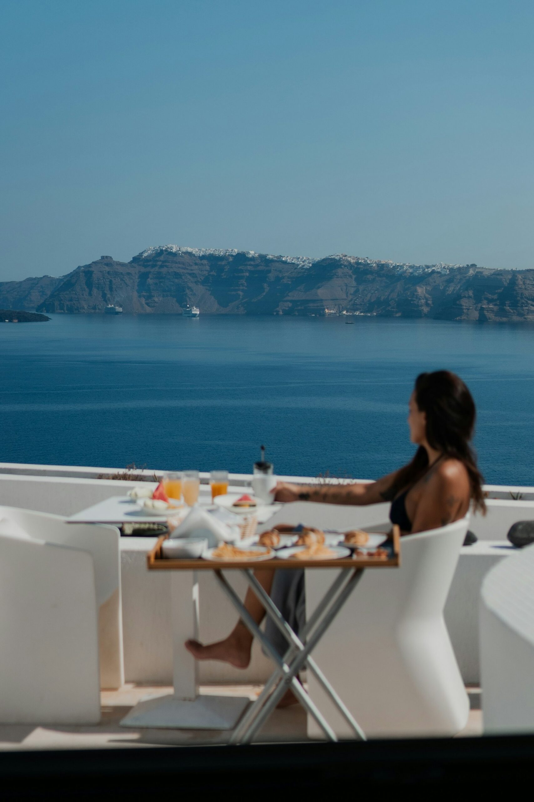 Breakfast on deck with a view of the sea and cliffs